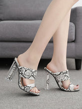 Sandales à Talons Cristal Python – Élégance et Audace